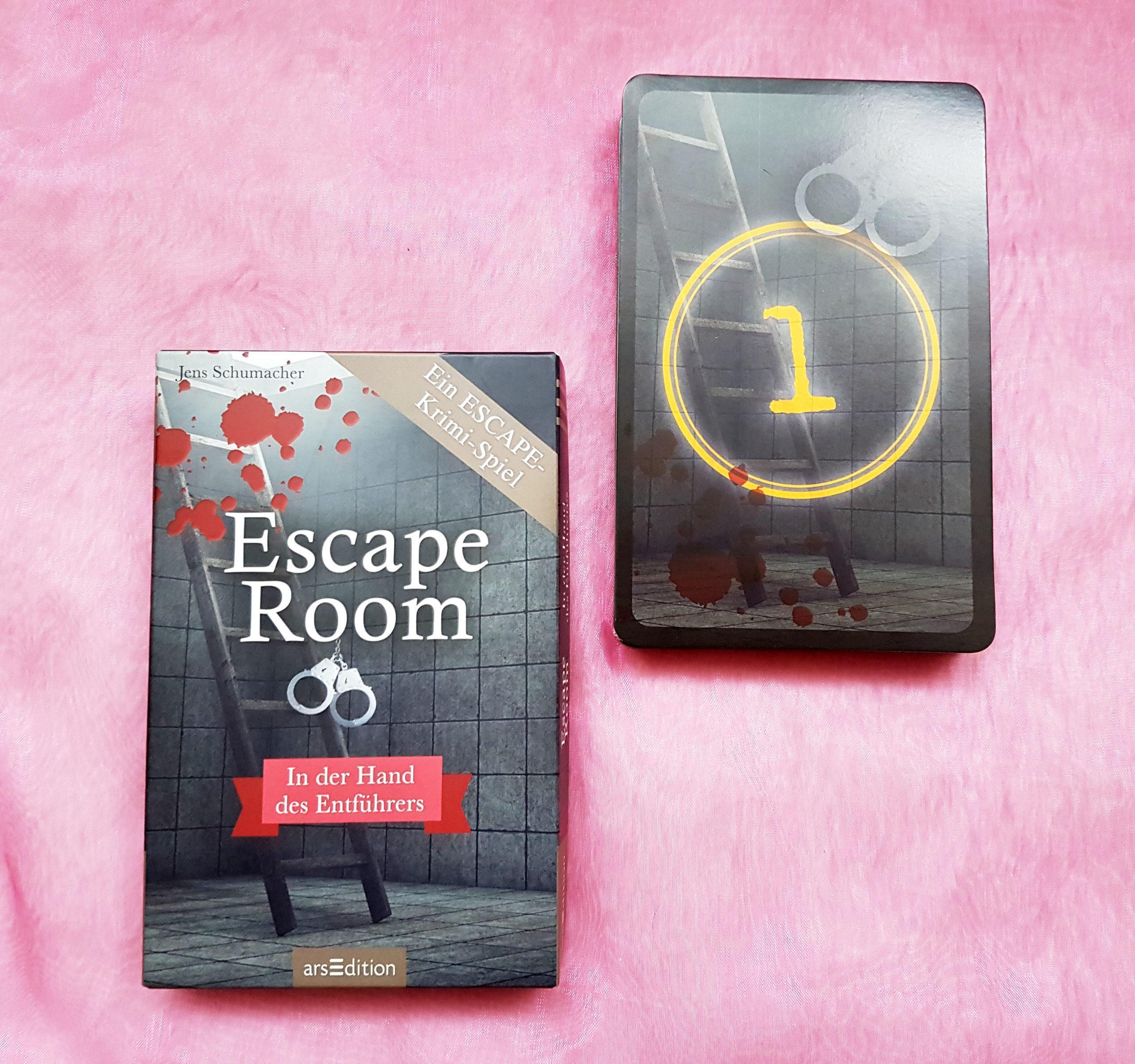 Box und Karten zum Spiel Escape Room - In der Hand des Entführers.